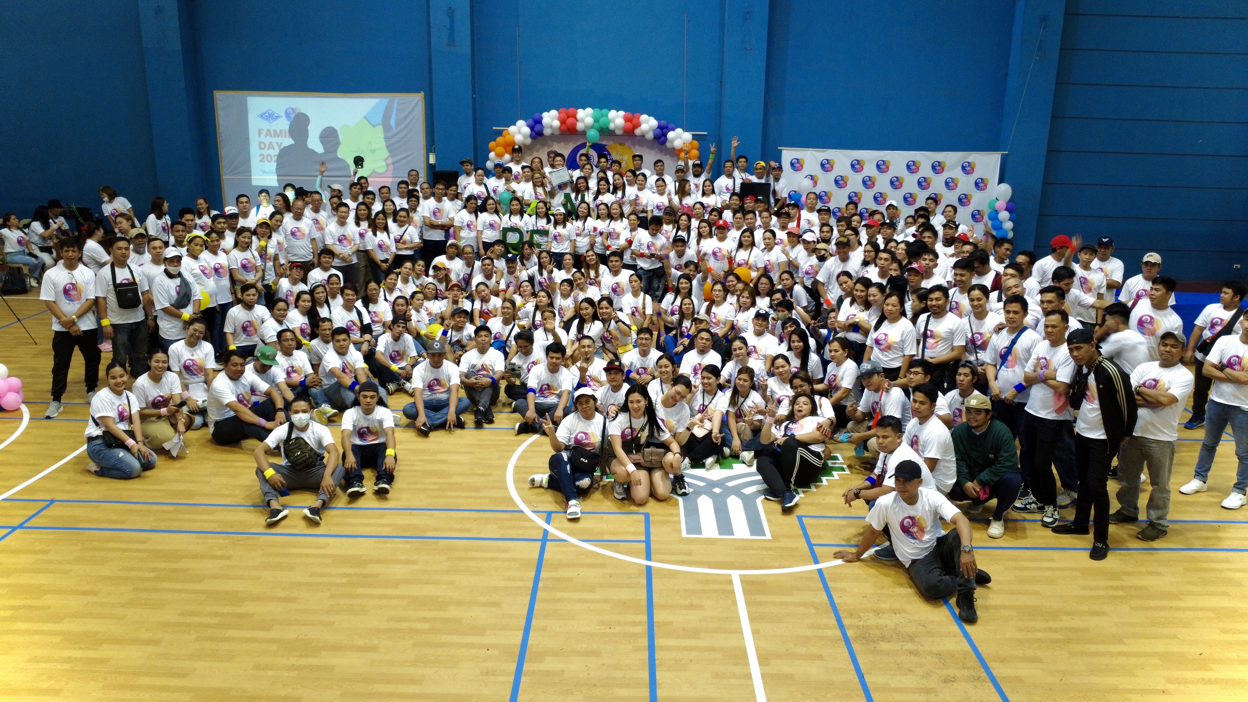 A group photo of diverse and happy employees